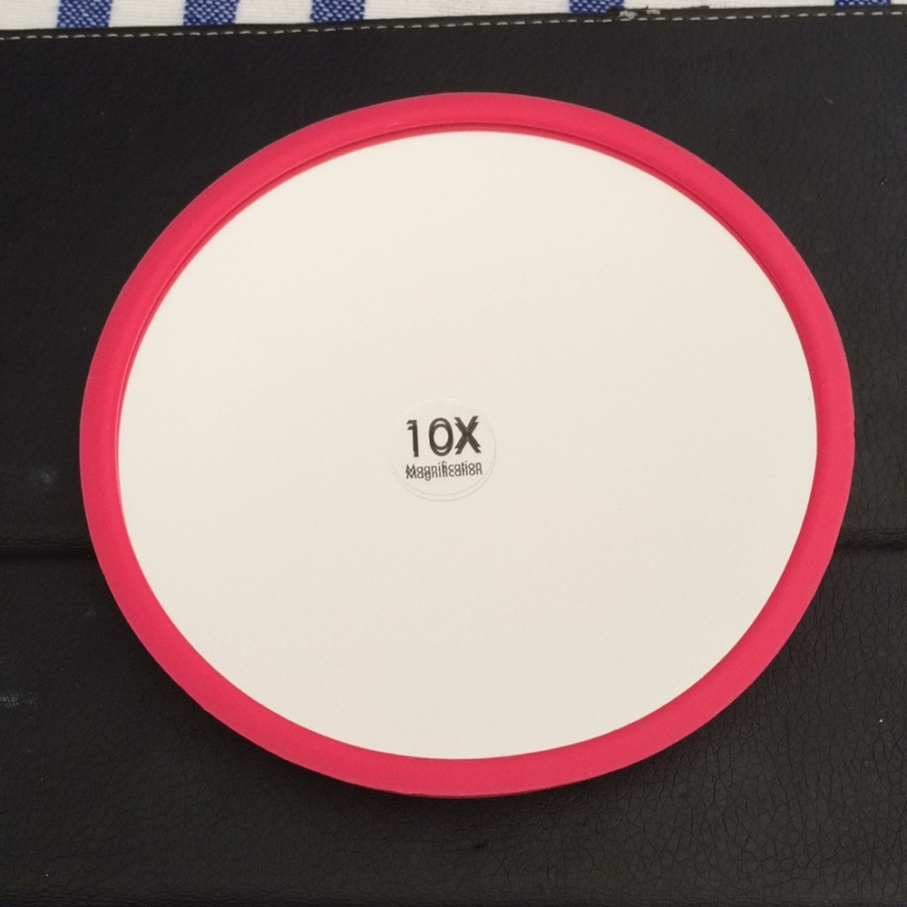 COPY - Just Own It. A magnifying mirror.